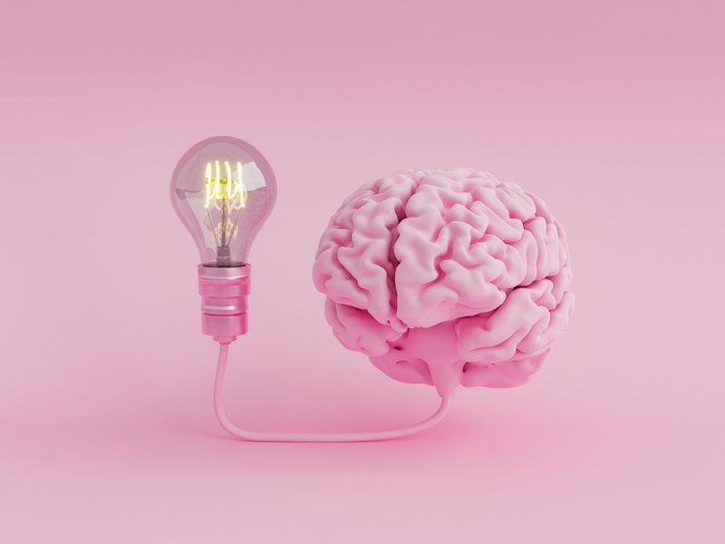 Brain Connected to an Illuminated Light Bulb